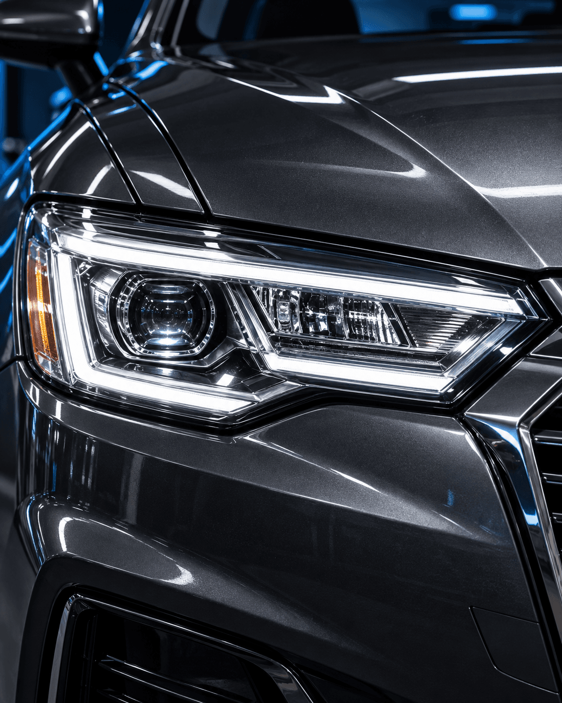 Clear polished vehicle headlight lens after restoration