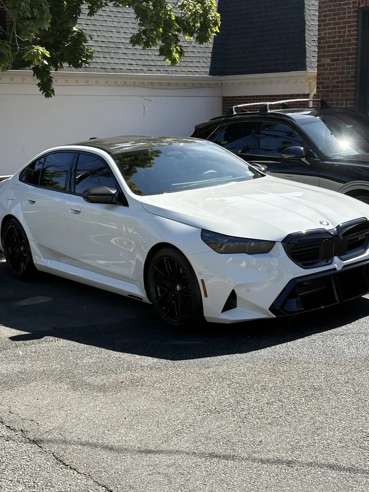 BMW M5 in Alpine White with carbon fiber roof detailed at CleanWorx Basking Ridge
