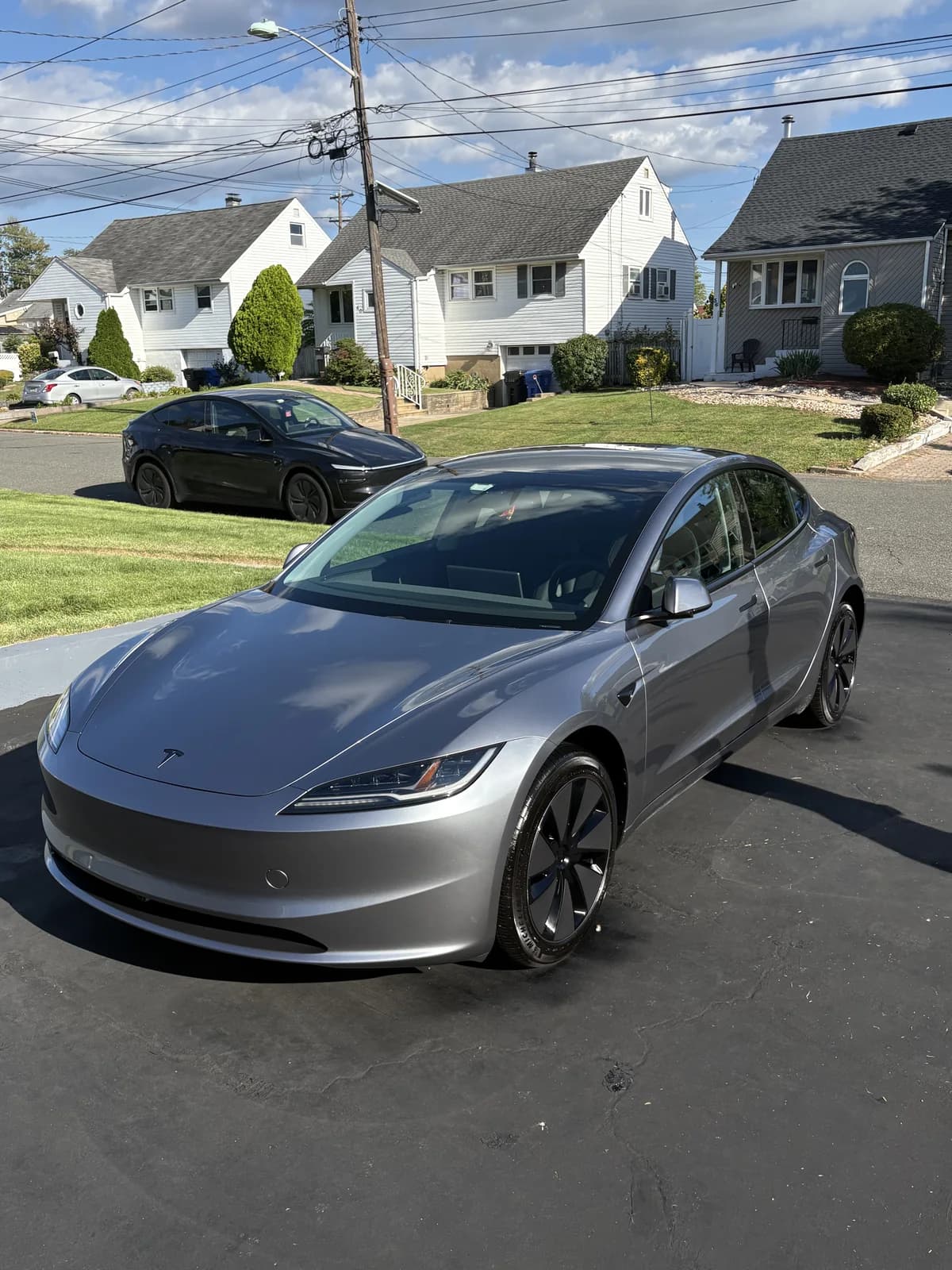 New Tesla Model 3 Highland detailed on customer driveway by CleanWorx Mobile Detailing